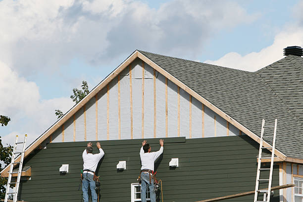 Professional Storm Damage Siding Repair technician working in Corning, OH